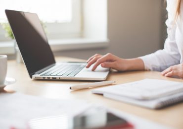 Business Woman Working on Laptop
